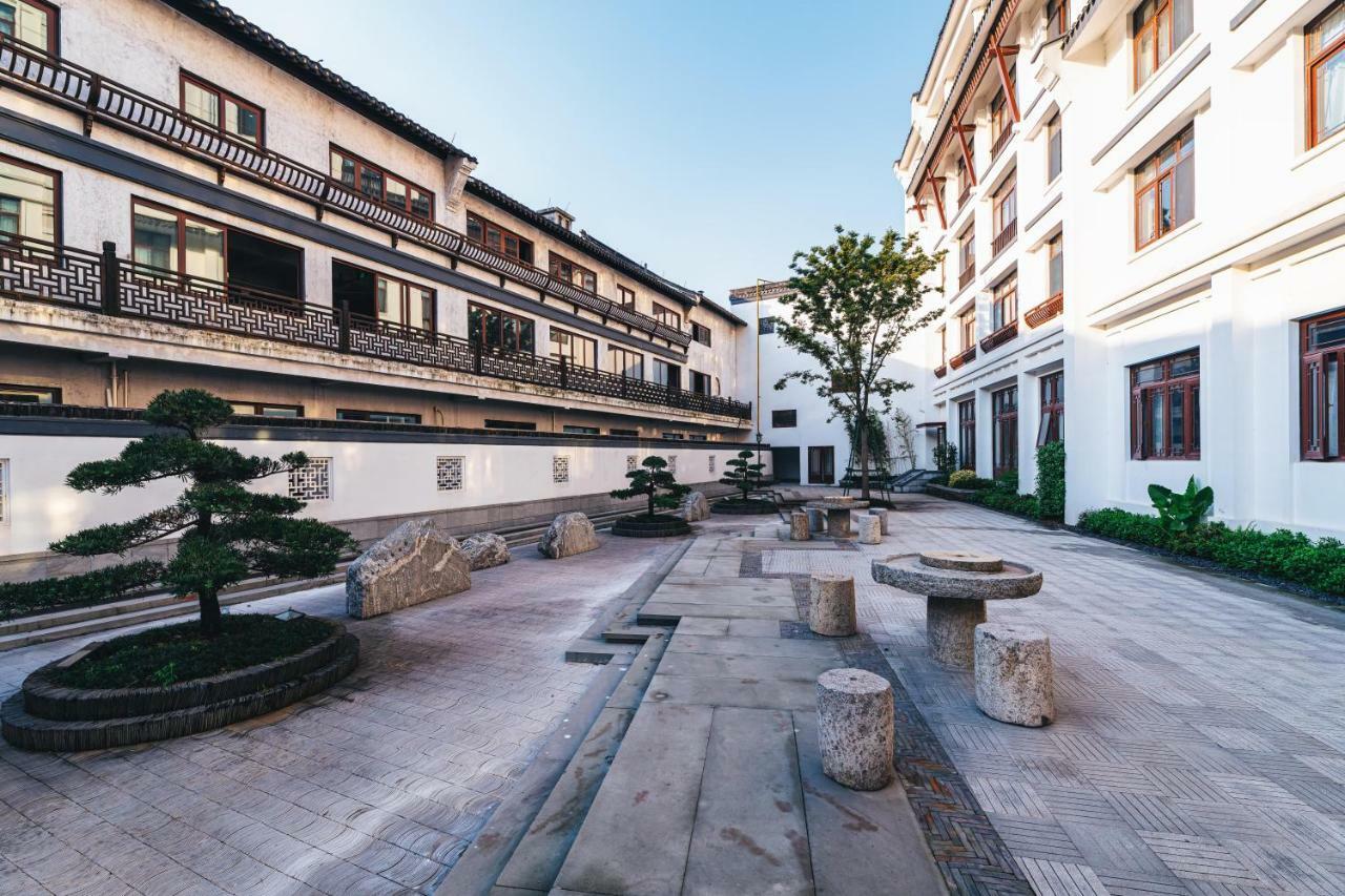 เอทัวร์ โฮเต็ล ไห่หนิง เลทเทอร์ซิตี้ หนานกวนเซียง Hotel Haining ภายนอก รูปภาพ