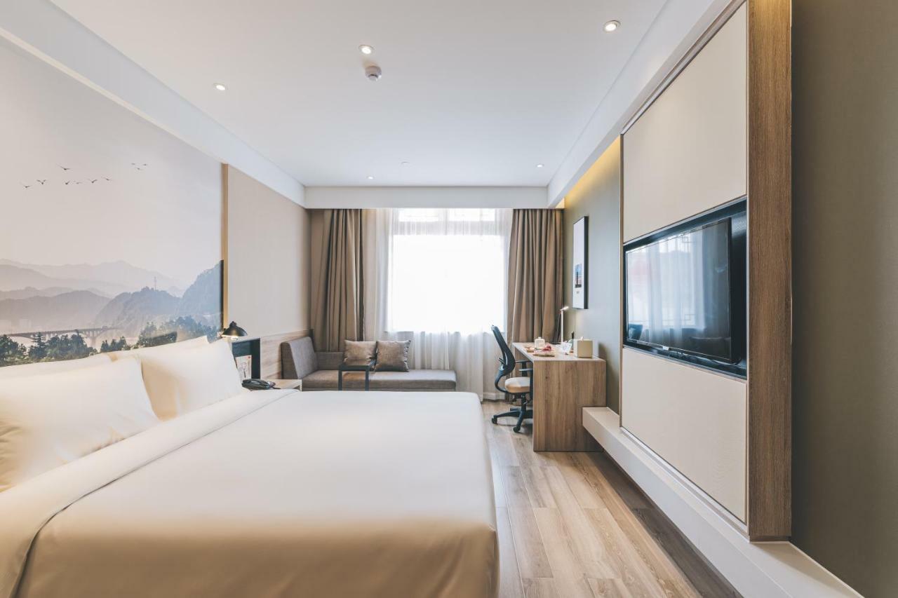 เอทัวร์ โฮเต็ล ไห่หนิง เลทเทอร์ซิตี้ หนานกวนเซียง Hotel Haining ภายนอก รูปภาพ