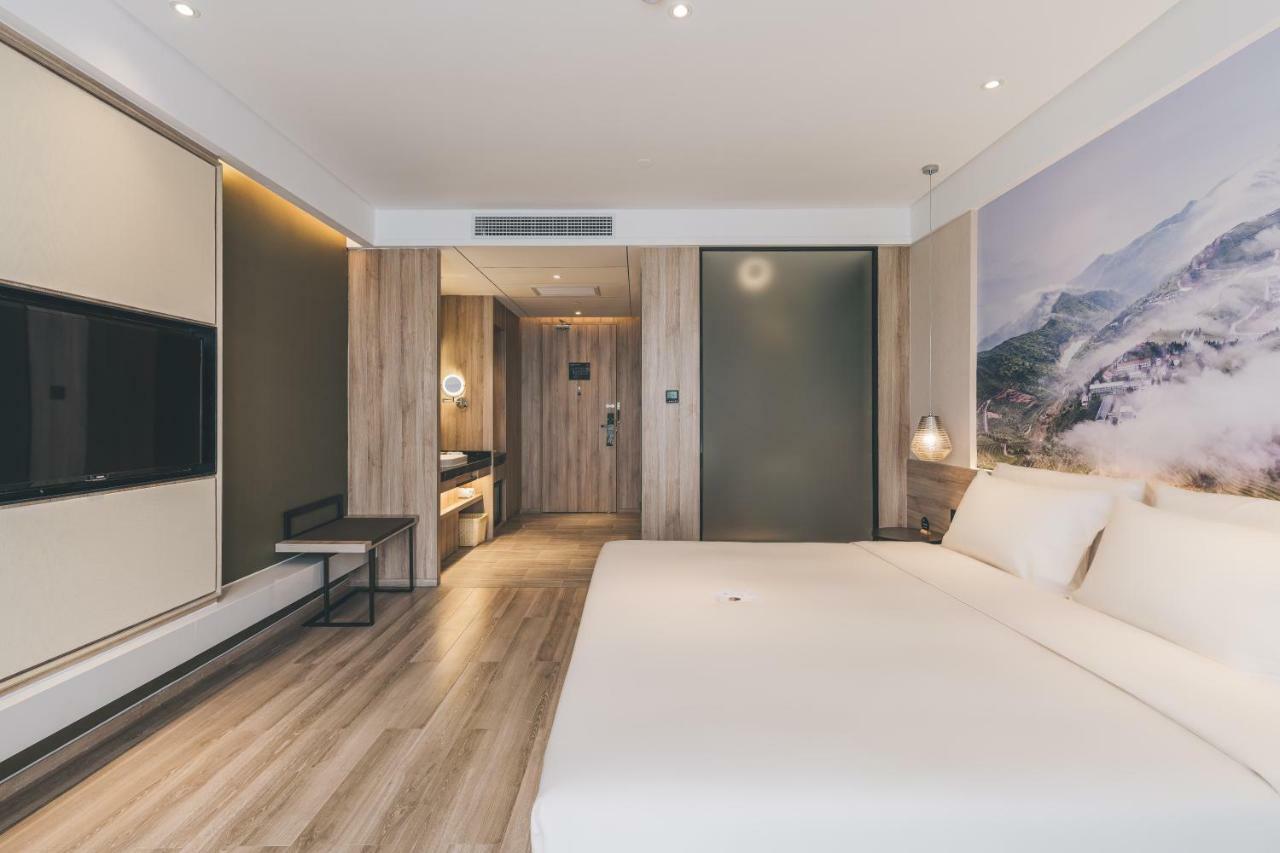 เอทัวร์ โฮเต็ล ไห่หนิง เลทเทอร์ซิตี้ หนานกวนเซียง Hotel Haining ภายนอก รูปภาพ